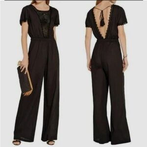 LoveShackFancy XS Jumpsuit
Cotton & crochet jumpsuit
Open back, ties at neck